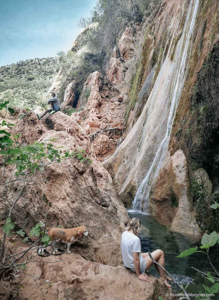 Cascade waterfall Imouzzer morocco dog girl